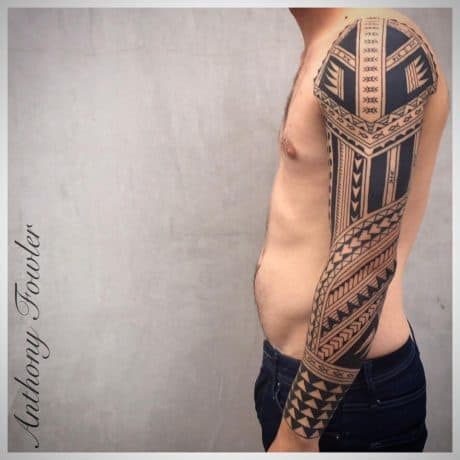Tribal Style Polynesian tattoo in arm