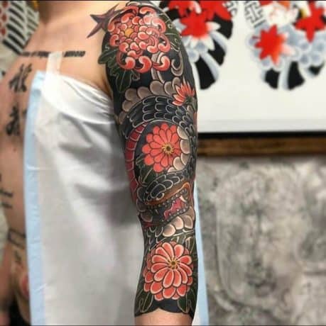 Floral Snake Japanese Style tattoo in arm