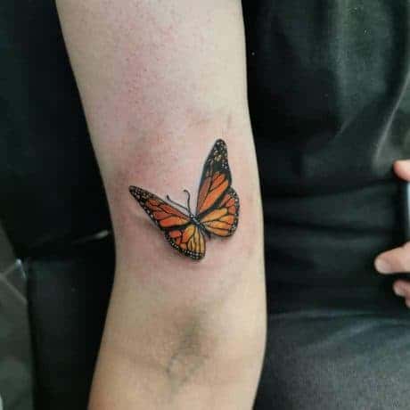 Butterfly tattoo on arm