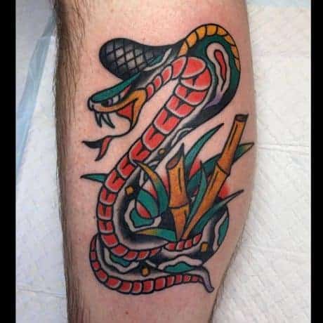 Traditional Snake tattoo in leg