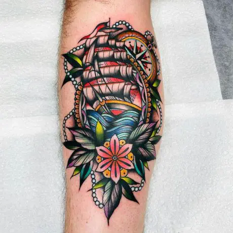 Traditonal Ship tattoo in leg