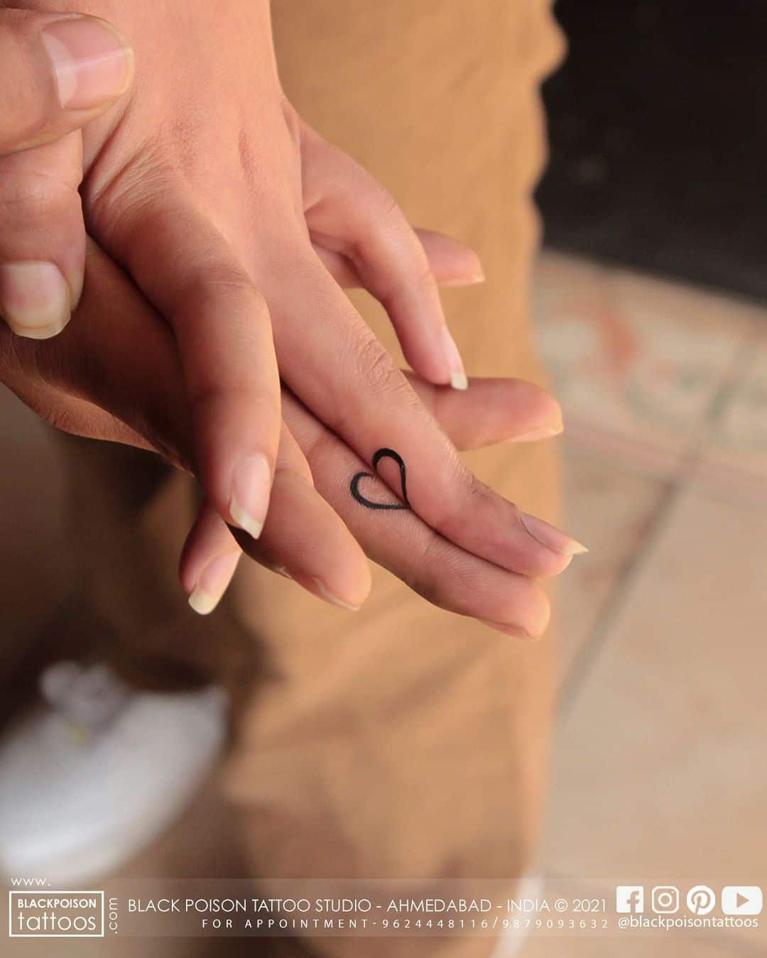 Couple Heart tattoo on fingers