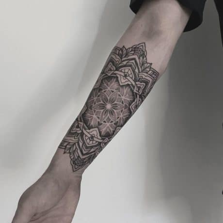 Mandala tattoo on arm