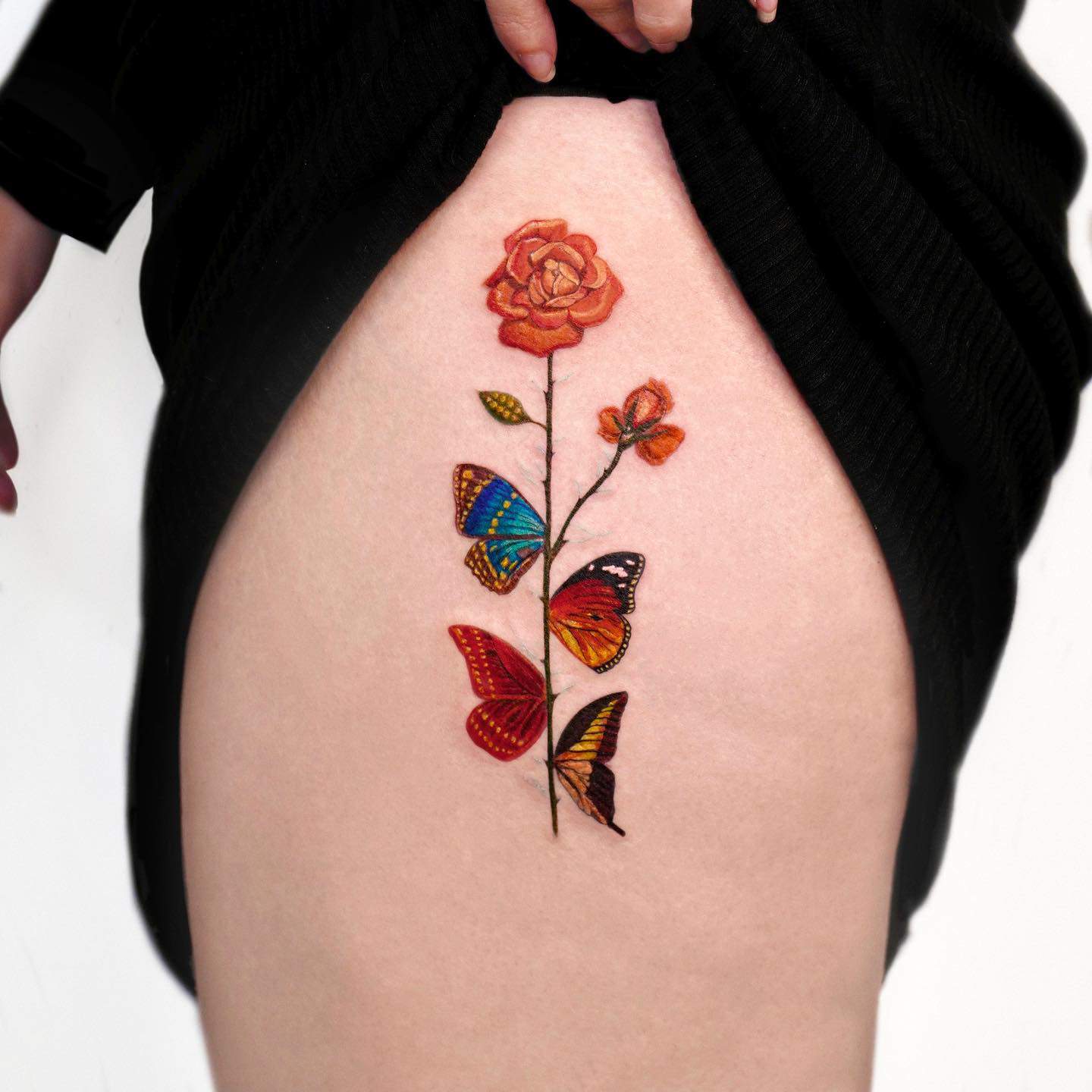 butterflies and rose tattoo