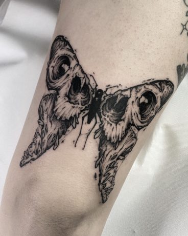 horror style butterfly tattoo