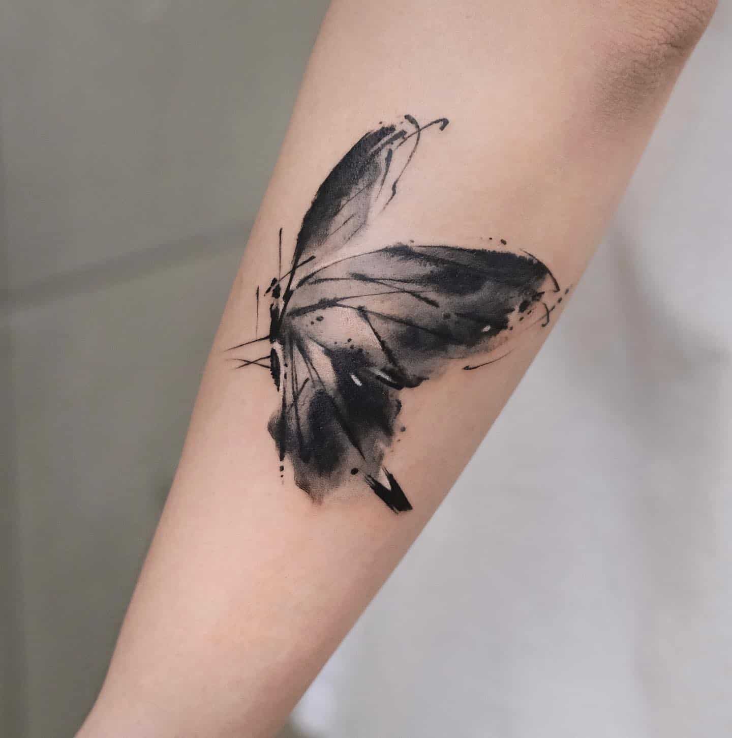watercolor style butterfly tattoo