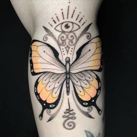 yellow wing dotwork style butterfly tattoo 