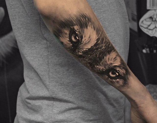 Wolf eyes tattoo by Kenn Skogli