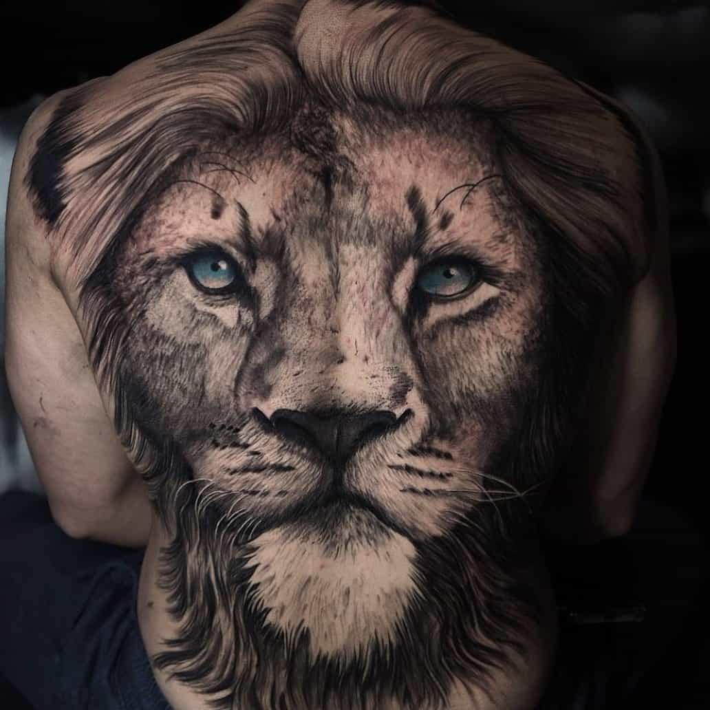 big lion head tattoo on back