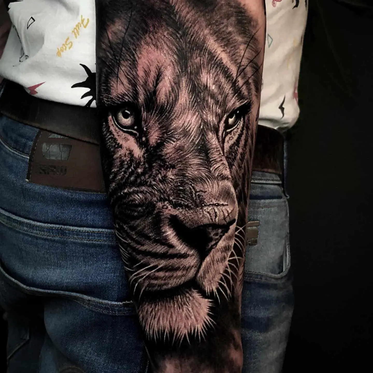 black and grey lion tattoo