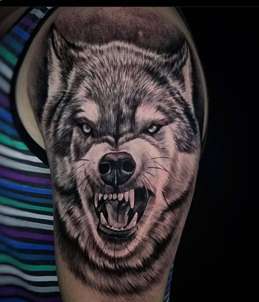 black and grey style wolf tattoo