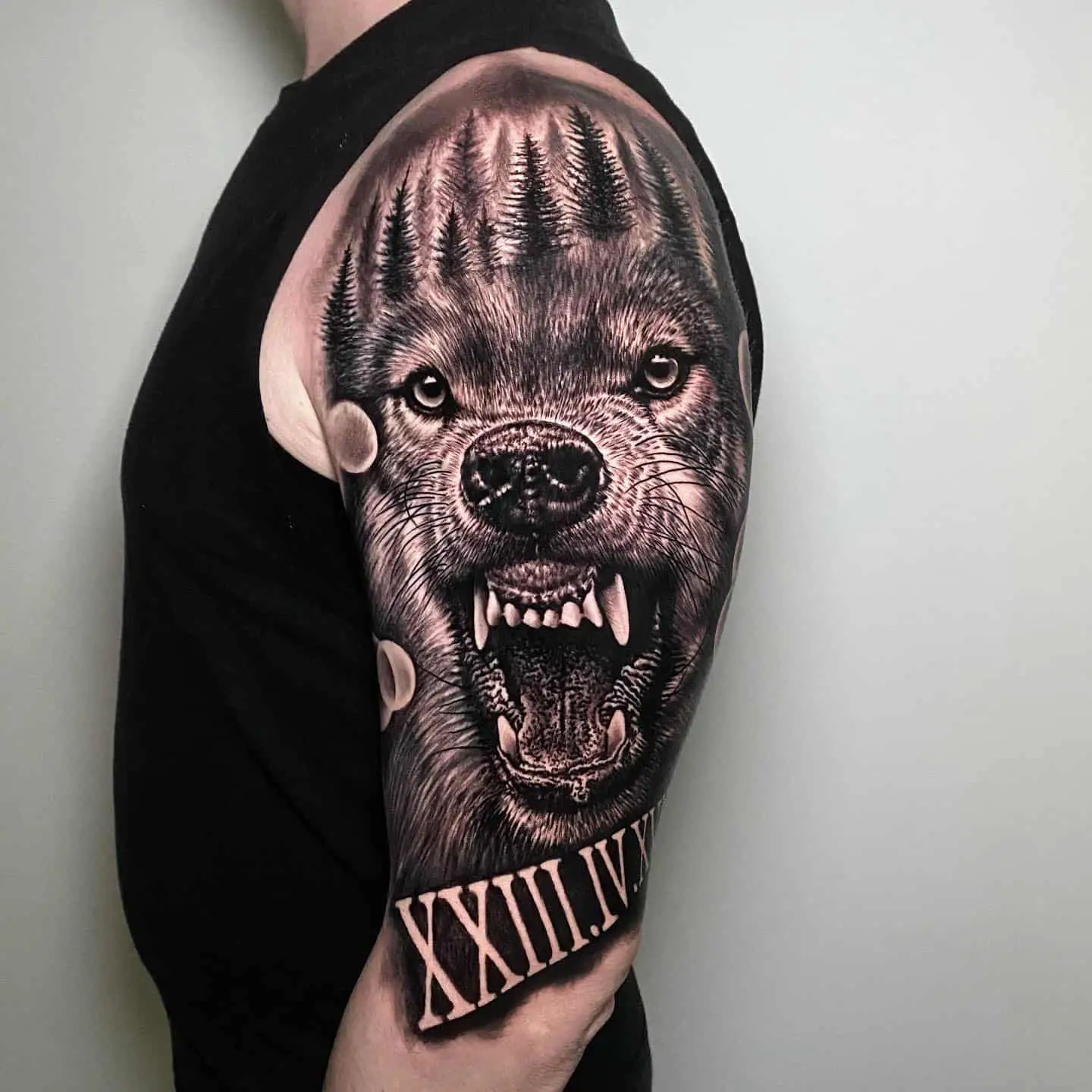 black and grey wolf tattoo