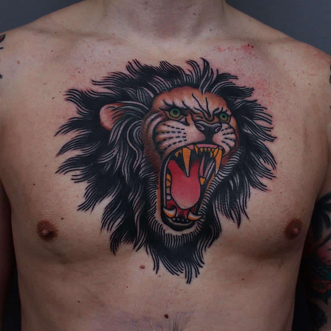fierce lion tattoo on chest