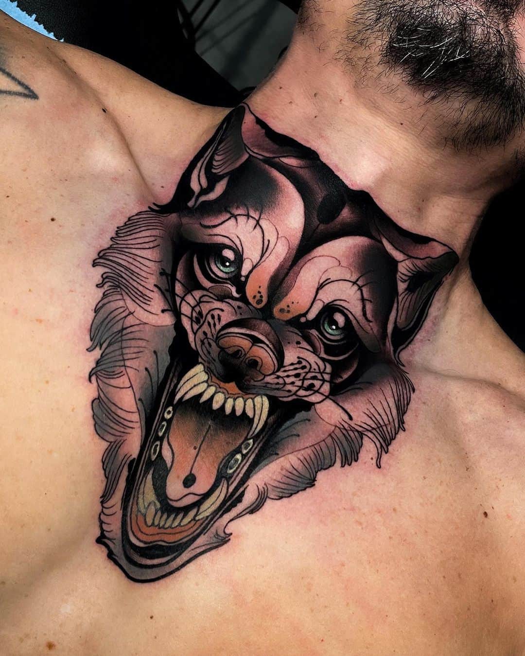 fred.bertoli neotraditional wolf tattoo on chest