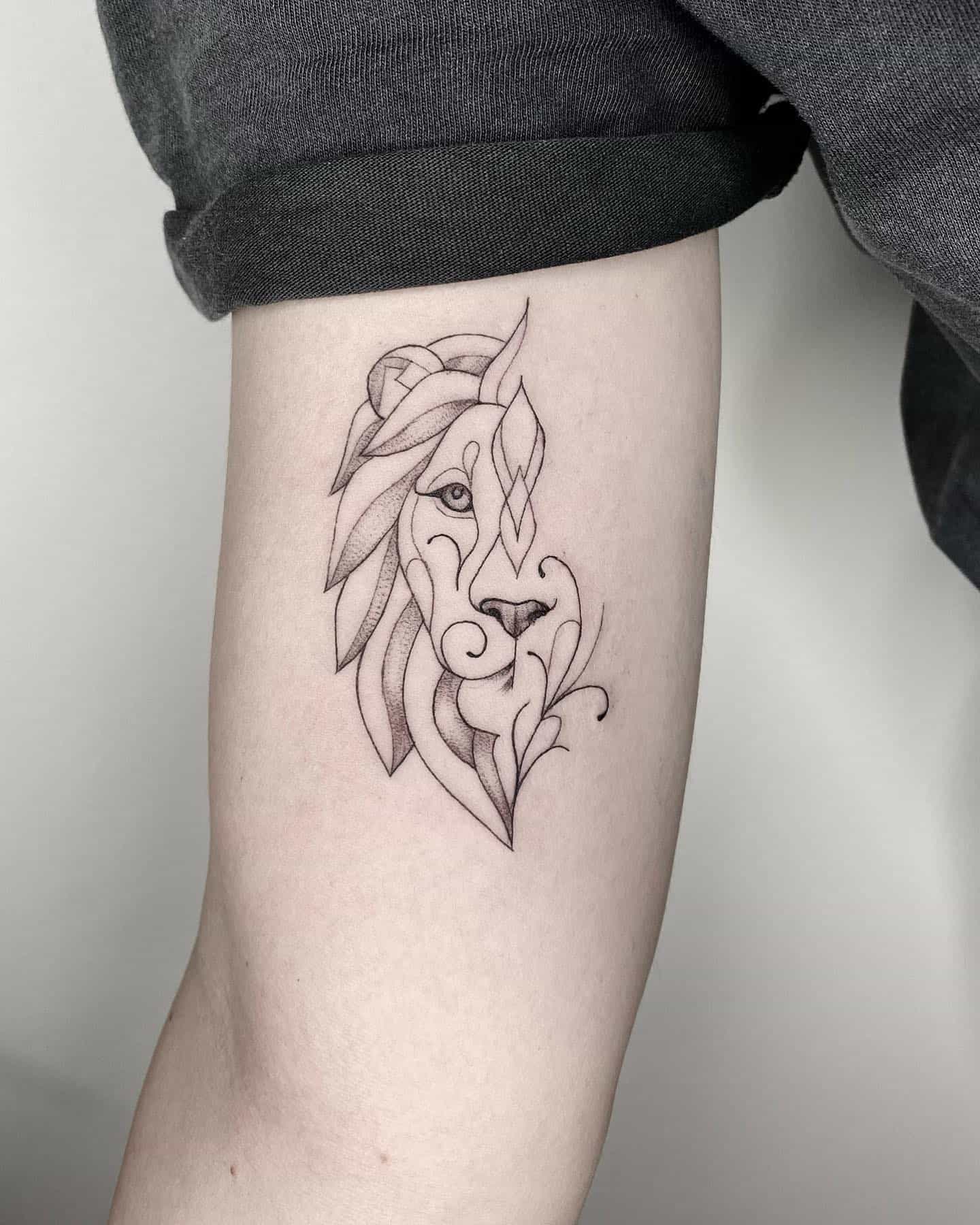 geometric style lion tattoo