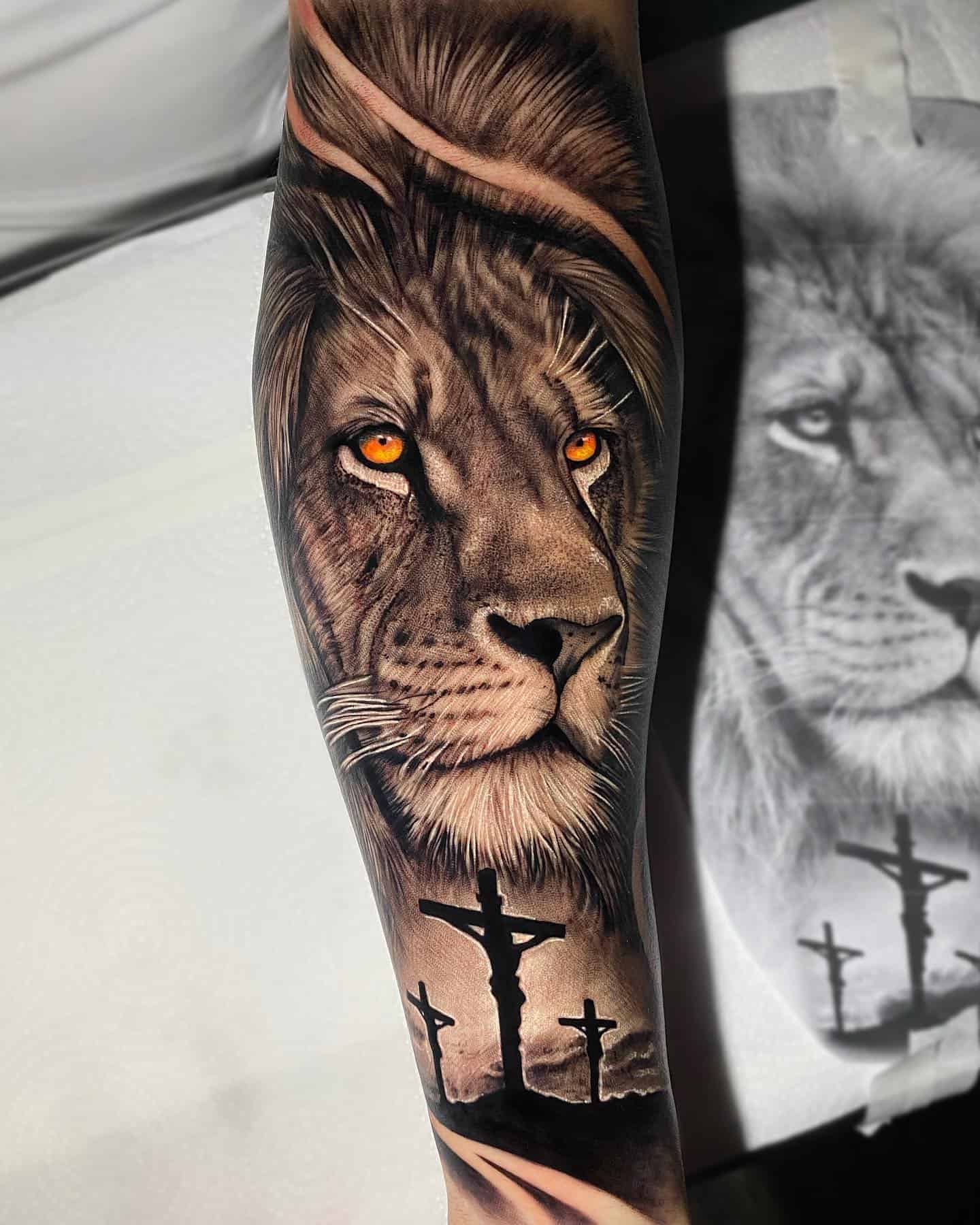 lion and cross tattoo