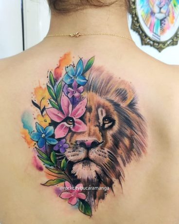 colorful floral lion back tattoo