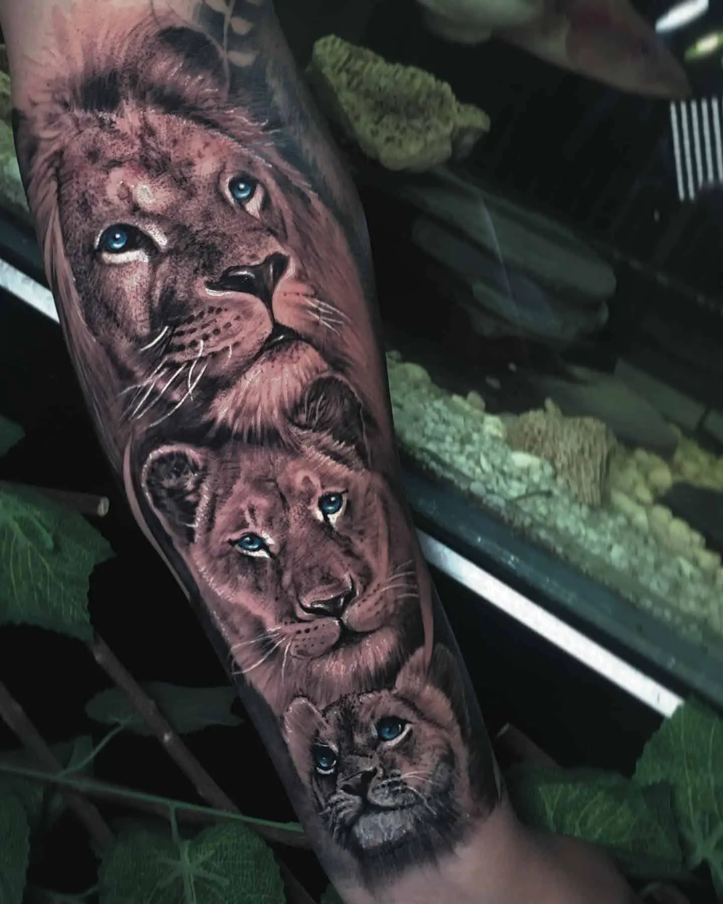 lion family tattoo on hand