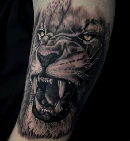 roaring lion tattoo on hand
