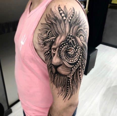 tribal lion tattoo on arm