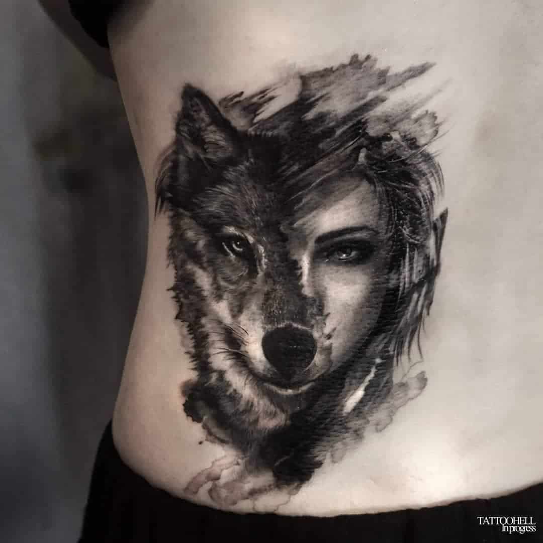 wolf and women tattoo by tattooist hell