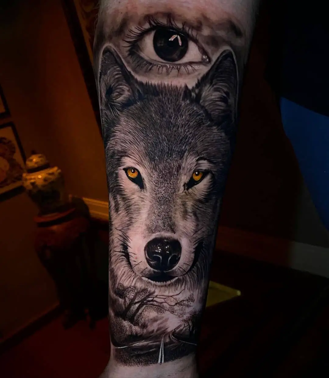 wolf face tattoo on forearm by bacca ink