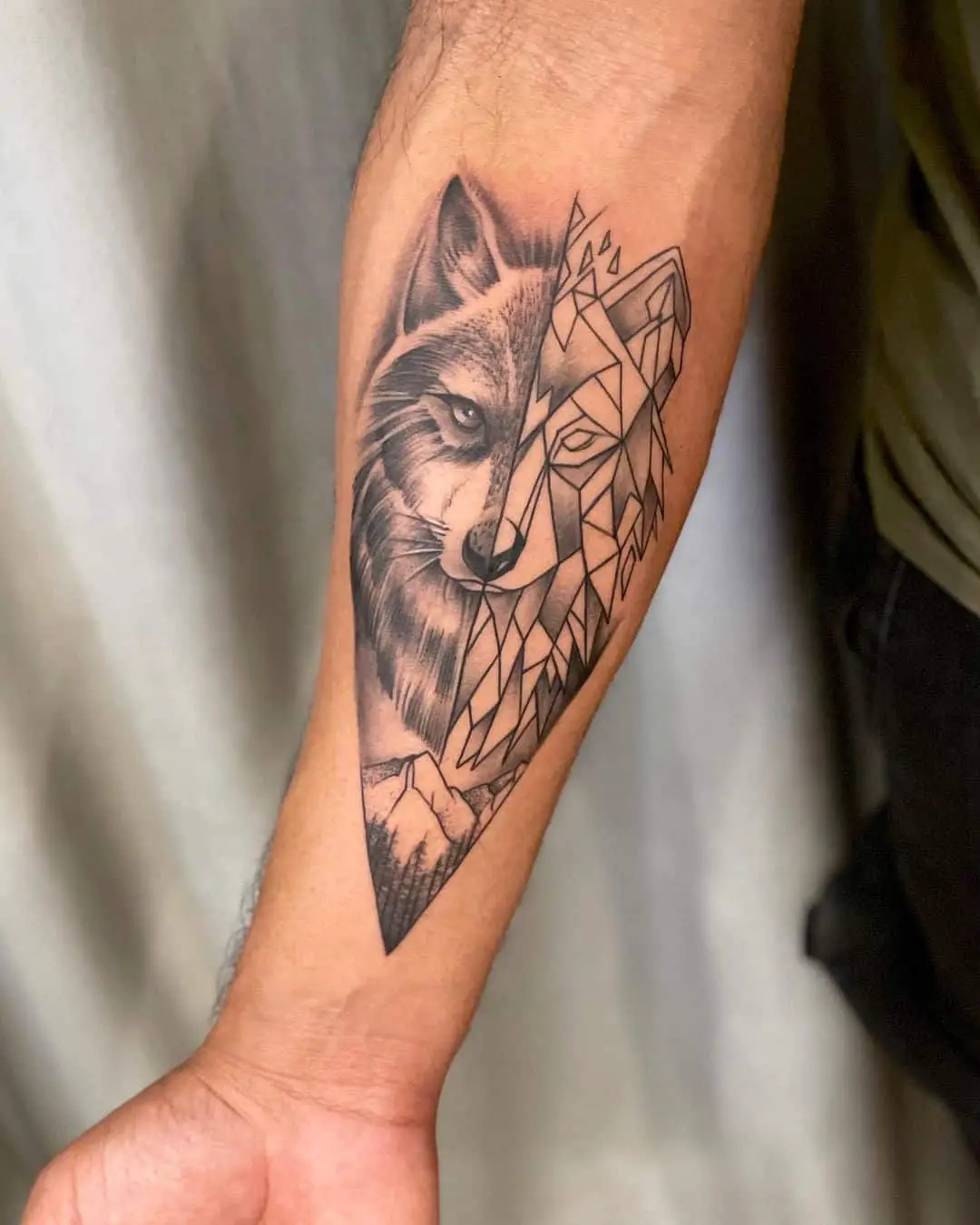 wolf half face geometric tattoo by mr.jones .tattoo