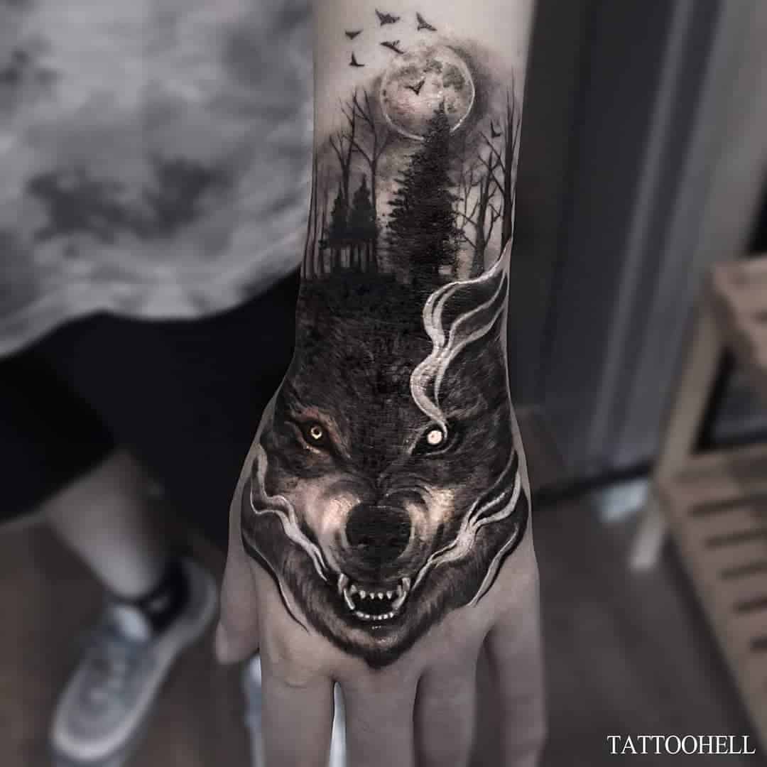 wolf hand tattoo by tattooist hell