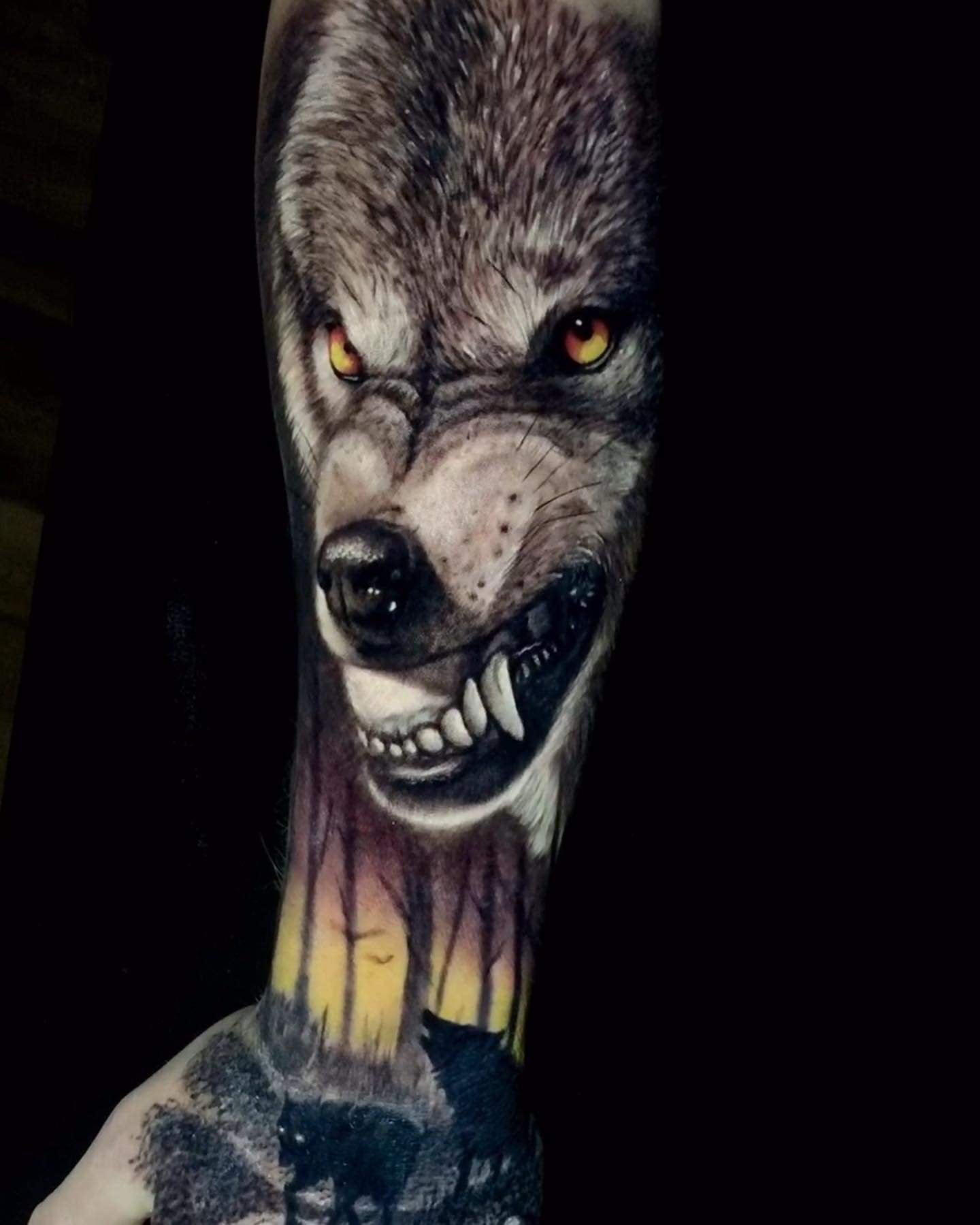 wolf tattoo in arm