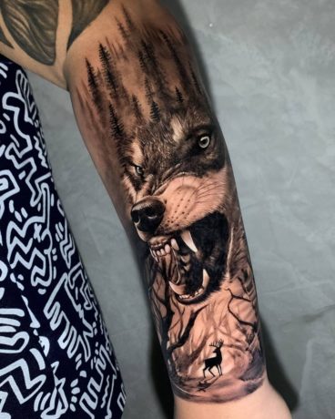 wolf forearm tattoo