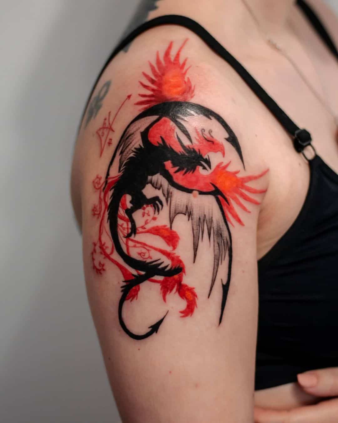 Dragon and phoenix tattoo