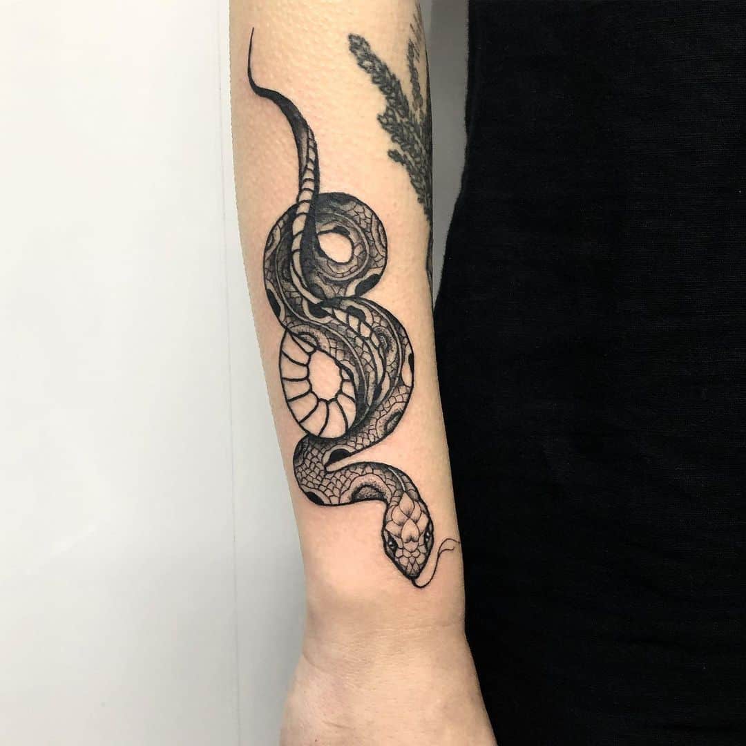 snake tattoo on forearm 