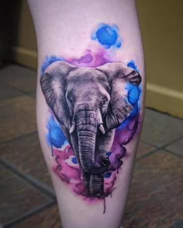 colored elephant tattoo by desv.tattoos