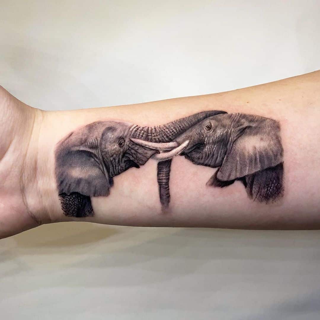 couple elephant tattoo