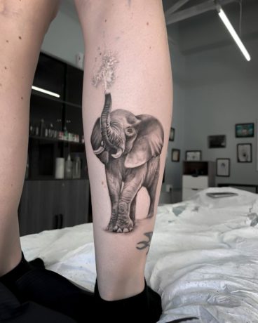 elephant tattoo on leg