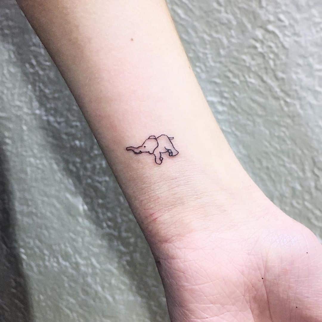 elephant tattoo on wrist 