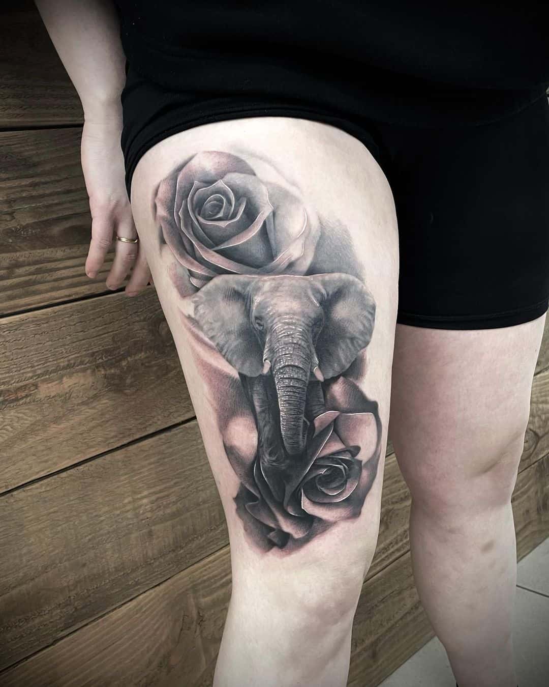 flower raped elephant tattoo