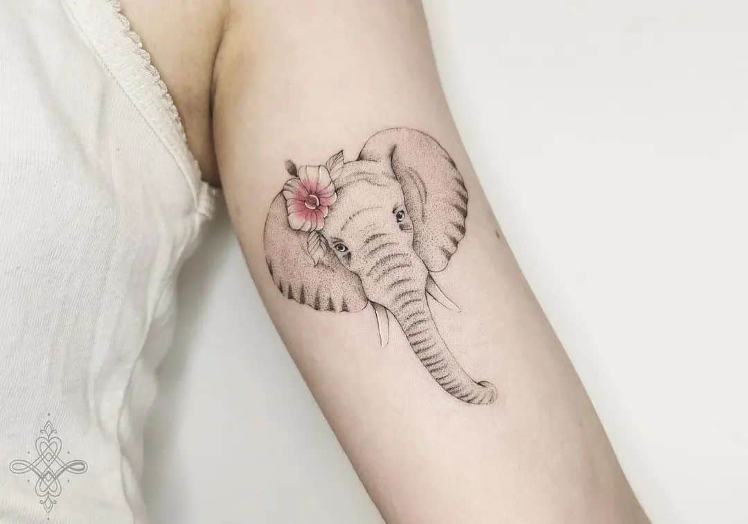flower on head of elephant tattoo