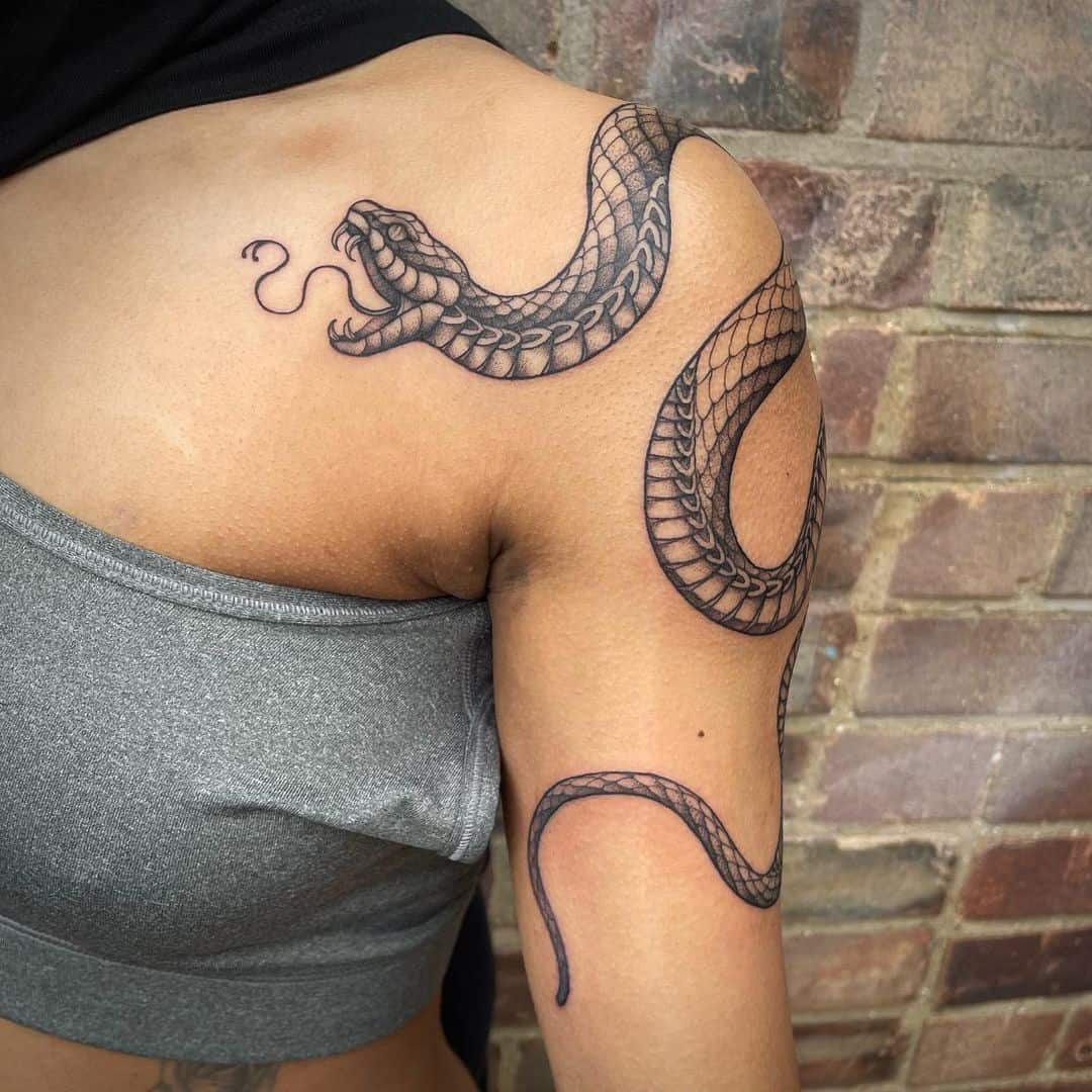 snake tattoo on shoulder