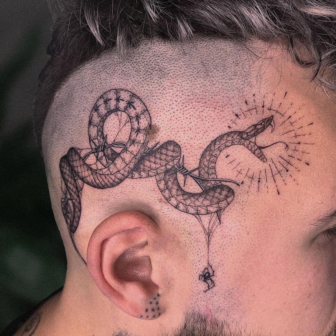 snake tattoo on head