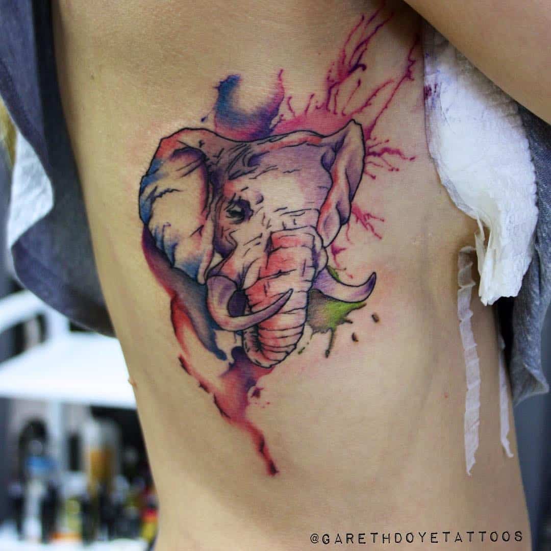 water colored elephant tattoo 