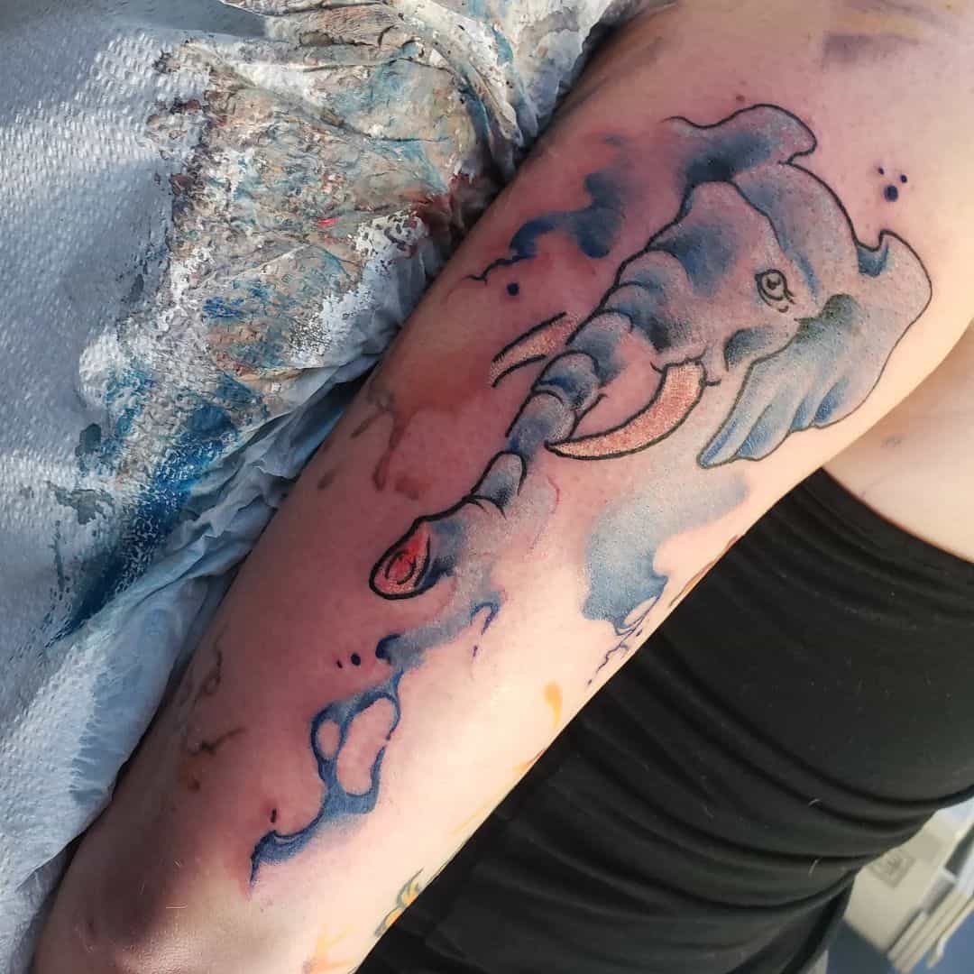 water colored elephant tattoo 
