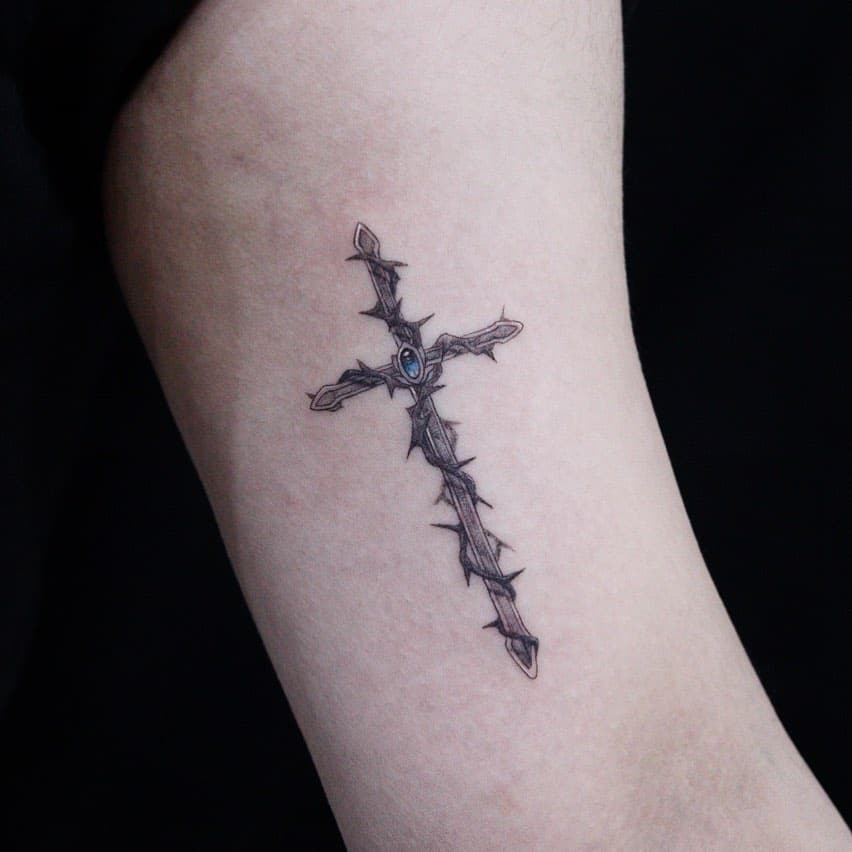 sword style cross tattoo