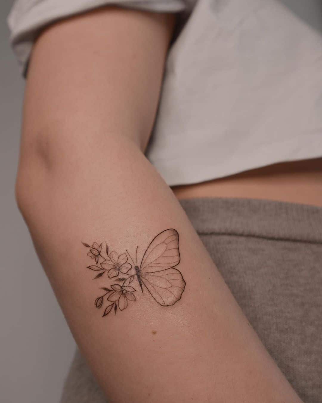 butterfly tattoo on foream