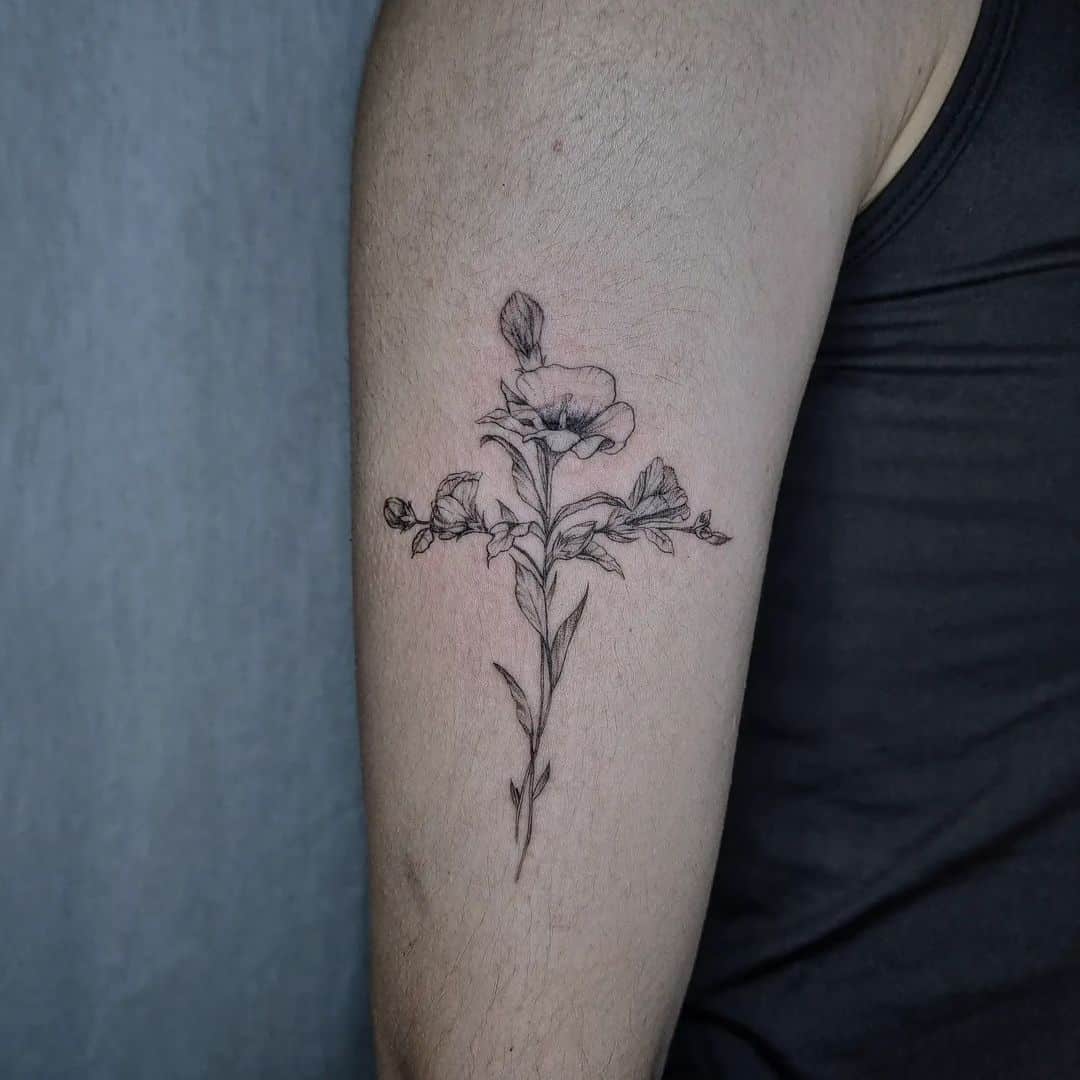 beautiful flower and cross  tattoo