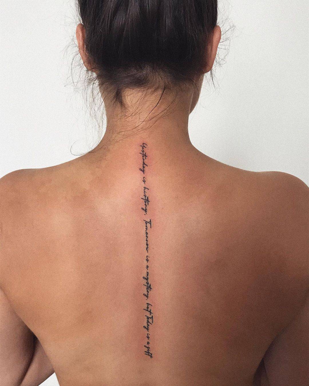 long message tattoo on back