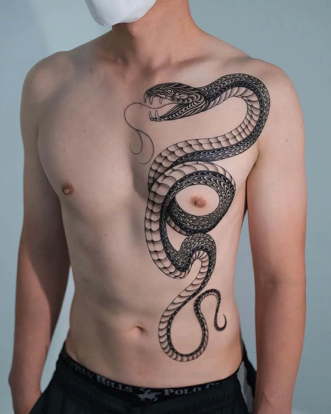 snake tattoo on chest 