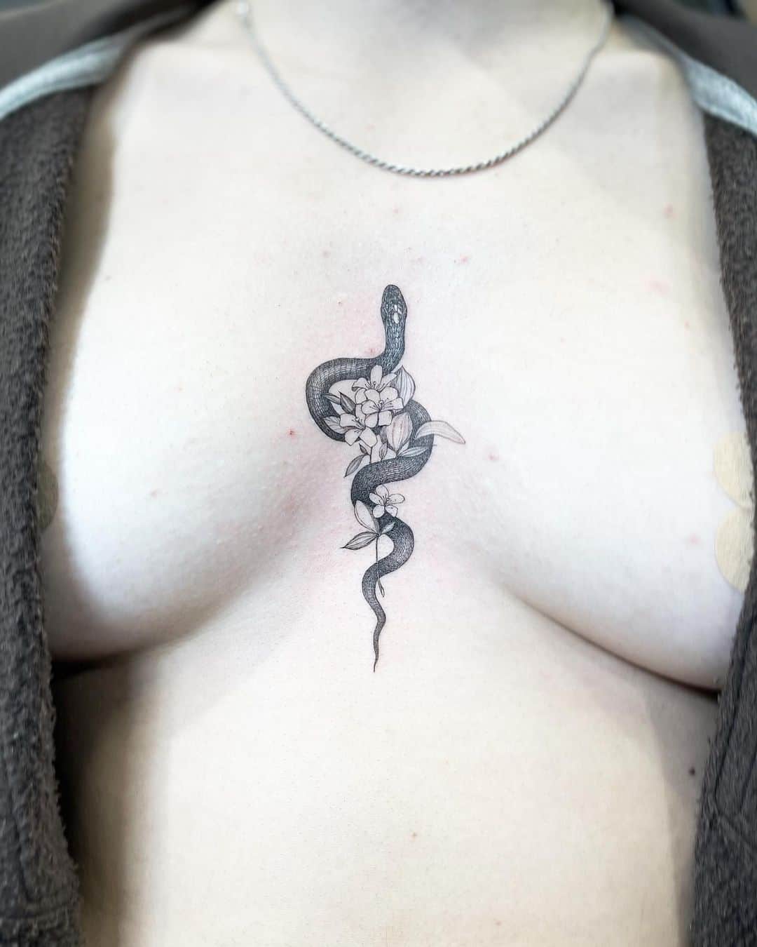 snake tattoo on chest