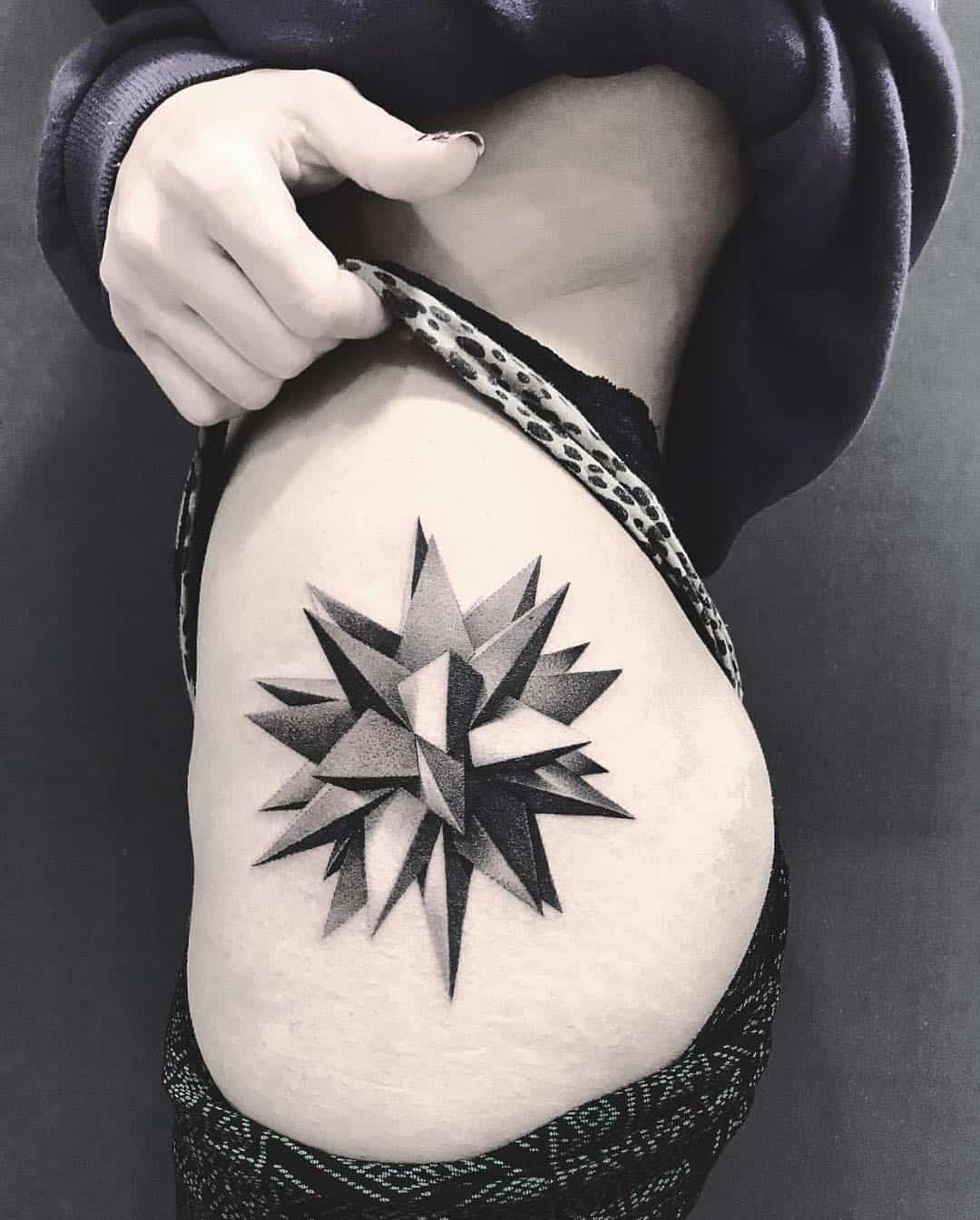 spike geometrical tattoo