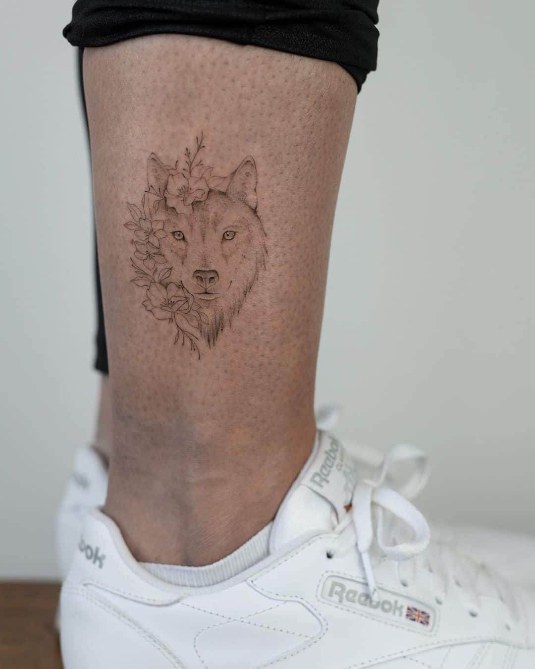 fine cute wolf tattoo